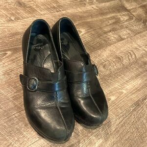 Dansko clogs. Cute. Stylish. Just right for any professional!